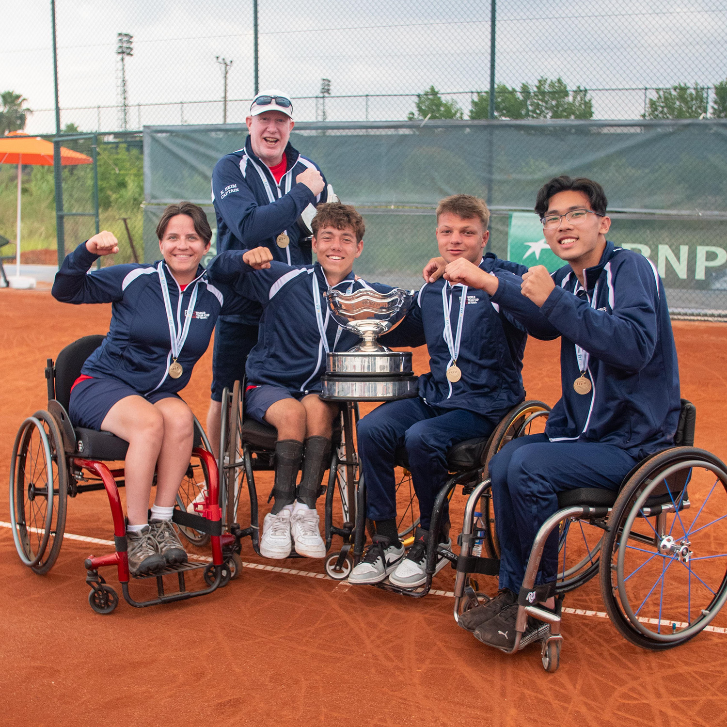 2024 World Team Cup Juniors Champions (L-R) Sabina Czauz, Head Coach Kevin Heim, Charlie Cooper, Tomas Majetic and Max Wong